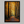 Framed wall art of a golden autumn forest path bathed in amber light. A tranquil seasonal woodland print. Ready to hang.