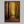 Framed wall art of a golden autumn forest path bathed in amber light. A tranquil seasonal woodland print. Ready to hang.