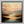 Framed wall art of a golden lake and hills at dusk. A tranquil painterly landscape print that brings warmth and peace. Ready to hang.