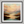 Framed wall art of a golden lake and hills at dusk. A tranquil painterly landscape print that brings warmth and peace. Ready to hang.