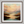 Framed wall art of a golden lake and hills at dusk. A tranquil painterly landscape print that brings warmth and peace. Ready to hang.