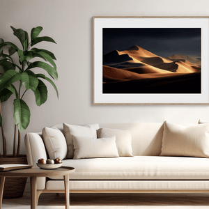 Framed desert wall art of glowing dunes at sunset. A fine art print capturing solitude, contrast, and the quiet beauty of golden light.