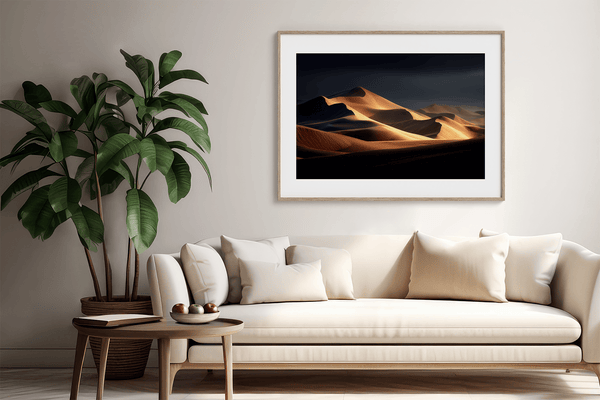 Framed desert wall art of glowing dunes at sunset. A fine art print capturing solitude, contrast, and the quiet beauty of golden light.