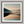 Framed wall art of a misty morning river winding through soft-hued mountains. A tranquil landscape print. Ready to hang.