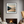 Framed wall art of a misty morning river winding through soft-hued mountains. A tranquil landscape print. Ready to hang.
