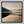 Framed wall art of a misty morning river winding through soft-hued mountains. A tranquil landscape print. Ready to hang.