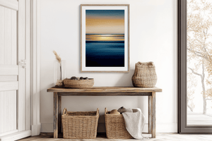 Abstract ocean sunset wall art styled in a calm neutral interior