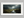 Light Breaks Over the Moor – Mountain Valley Wall Art Print in a white frame with a mount