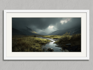 Light Breaks Over the Moor – Mountain Valley Wall Art Print in a white frame with a mount