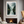 Framed wall art of a misty mountain lake. Peaceful watercolour tones, ready to hang or style your way.