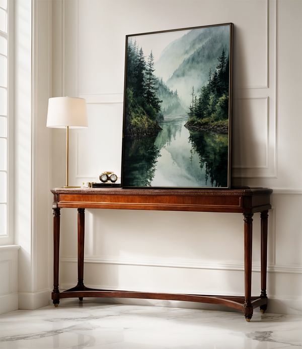 Framed wall art of a misty mountain lake. Peaceful watercolour tones, ready to hang or style your way.