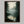 Framed wall art of evergreens, river, and mist in soft watercolours. A calm woodland scene, ready to hang.
