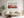 Pastel geometric landscape wall art styled in a calm neutral interior