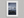 Quiet Reflections – Winter Mountain Lake Wall Art Print in a white frame with a mount