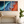 Coastal triptych framed wall art of teal waves and sienna sands. Framed or unframed ocean prints for serene, modern interiors.