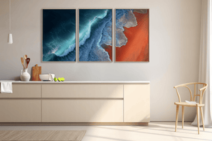 Coastal triptych wall art styled in a calm neutral interior