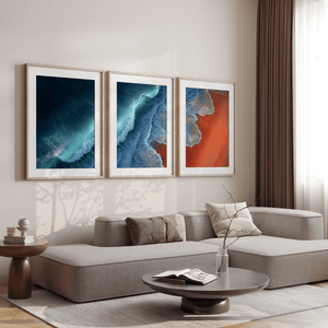 Coastal triptych wall art styled in a calm neutral interior