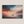 Framed canvas wall art of a glowing sunset and solitary boat. A calm seascape in warm hues, ready to hang.