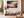 Sunset boat seascape canvas wall art styled in a calm coastal interior