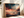 Sunset boat seascape canvas wall art styled in a calm coastal interior