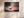 Twilight ocean boat canvas wall art styled in a calm coastal interior