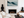 Framed snowy mountain canvas wall art styled in a calm neutral interior