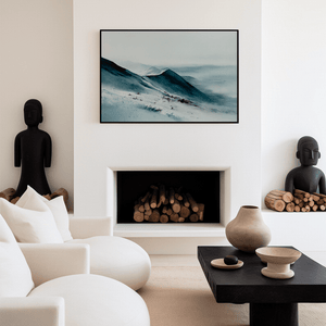 Framed canvas wall art of snowy peaks in soft watercolour blues and greys. A calm, minimalist mountain print. Ready to hang.