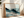 Framed snowy mountain canvas wall art styled in a calm neutral interior