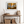 Framed wall art of silver birch trees glowing in golden light. A minimalist woodland print that brings calm and balance.