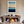 Framed wall art of a minimalist ocean horizon in pale blues and pastels. A serene abstract seascape print. Ready to hang.