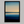 Framed wall art of a minimalist ocean horizon in pale blues and pastels. A serene abstract seascape print. Ready to hang.