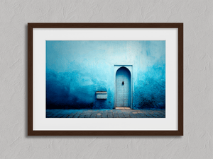 Framed blue Moroccan doorway print by Atelier Lumin