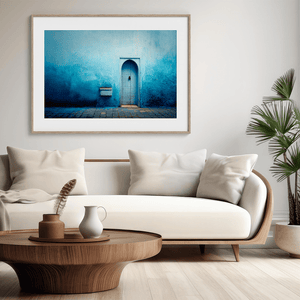 Framed fine art print of a Moroccan blue doorway. Minimalist travel-inspired wall art full of calm, texture, and timeless charm.