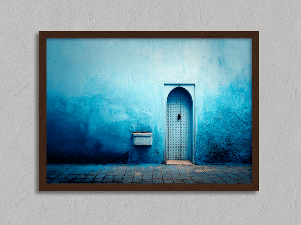Framed fine art print of a Moroccan blue doorway. Minimalist travel-inspired wall art full of calm, texture, and timeless charm.