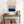 Framed wall art of a soft watercolour ocean sunrise in pastel tones. A calm, minimalist seascape print. Ready to hang.