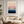 Framed wall art of a soft watercolour ocean sunrise in pastel tones. A calm, minimalist seascape print. Ready to hang.