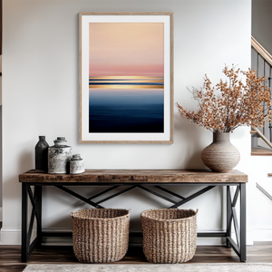 Framed wall art of a soft watercolour ocean sunrise in pastel tones. A calm, minimalist seascape print. Ready to hang.