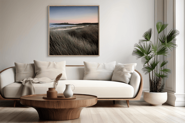 Serene Northumberland Castle at sunset with seagrass and tidal reflections — a tranquil wall art print for peaceful, coastal-inspired interiors.