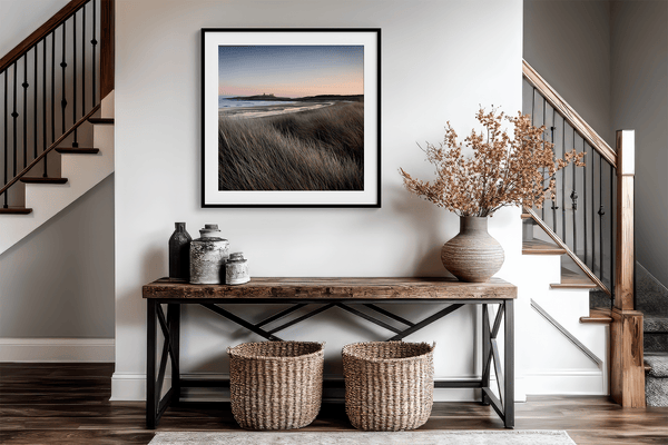 Serene Northumberland Castle at sunset with seagrass and tidal reflections — a tranquil wall art print for peaceful, coastal-inspired interiors.