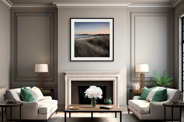 Serene Northumberland Castle at sunset with seagrass and tidal reflections — a tranquil wall art print for peaceful, coastal-inspired interiors.