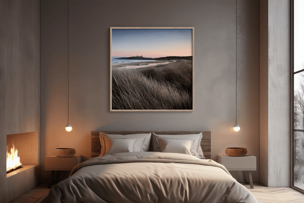 Serene Northumberland Castle at sunset with seagrass and tidal reflections — a tranquil wall art print for peaceful, coastal-inspired interiors.