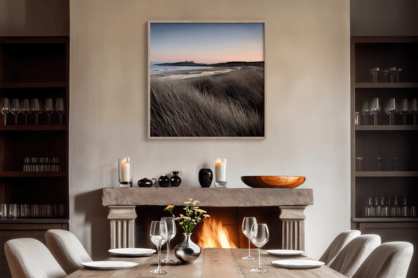 Serene Northumberland Castle at sunset with seagrass and tidal reflections — a tranquil wall art print for peaceful, coastal-inspired interiors.