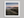 Tranquil Reflections – Northumberland Castle Wall Art in a white frame with a mount
