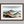 Framed wall art of watercolour mountain print in soft blues and greys. A quiet, misty landscape for calm interiors.