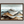 Framed wall art of watercolour mountain print in soft blues and greys. A quiet, misty landscape for calm interiors.