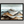 Framed wall art of watercolour mountain print in soft blues and greys. A quiet, misty landscape for calm interiors.