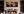 Framed autumn triptych wall art print with crimson amber and gold fall foliage