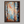 Framed wall art of birch trees in soft autumn light. Crimson and amber leaves drift in golden calm. A tranquil seasonal print.