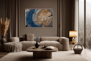 Horizontal tree ring wall art styled in a calm neutral interior