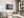 Horizontal tree ring wall art styled in a calm neutral interior